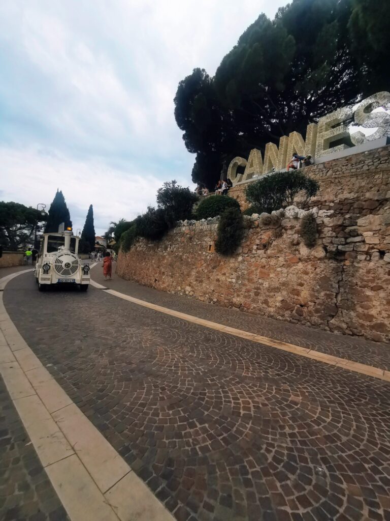 Cobbled road near the Cannes sign and Le Suquet old town on the French Riviera 