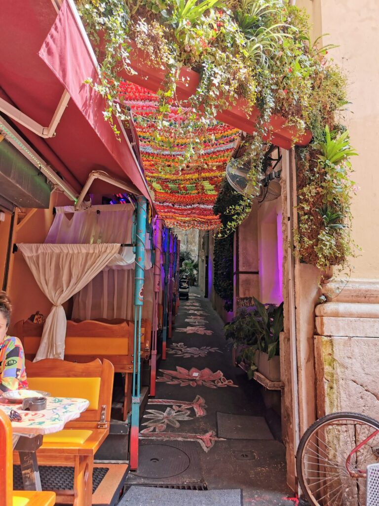 Colourful hidden street in a small European town in France. 