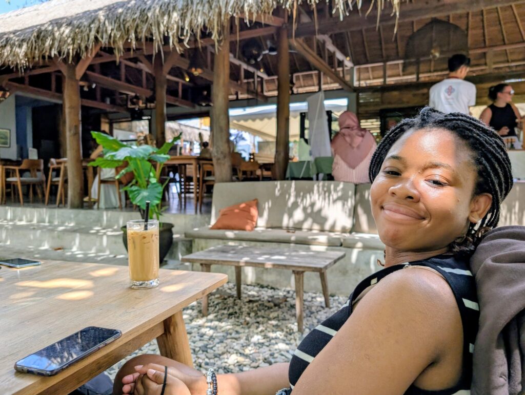 My daughter relaxing at an outdoor café in Bali.