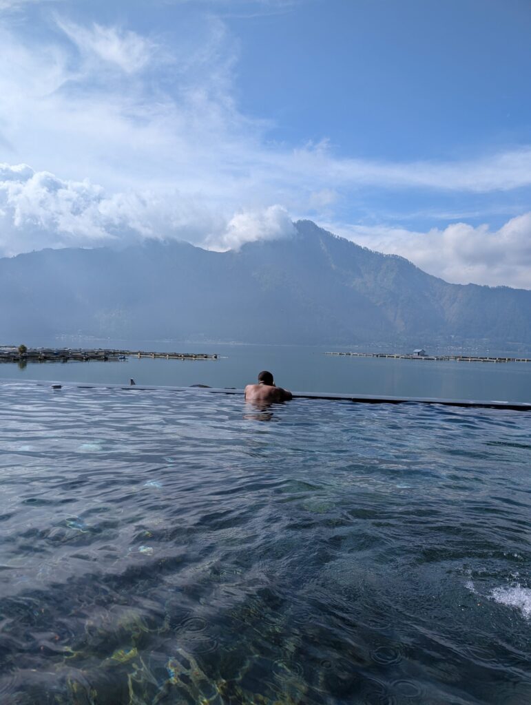 Batur natural hot springs overlooking Lake Batur and the mountains in Bali