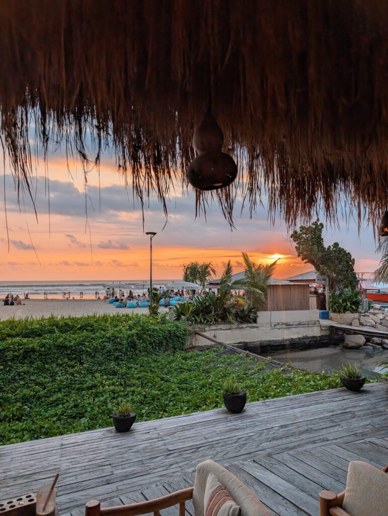 Sunset view from a beachfront restaurant recommended during our Bali trip
