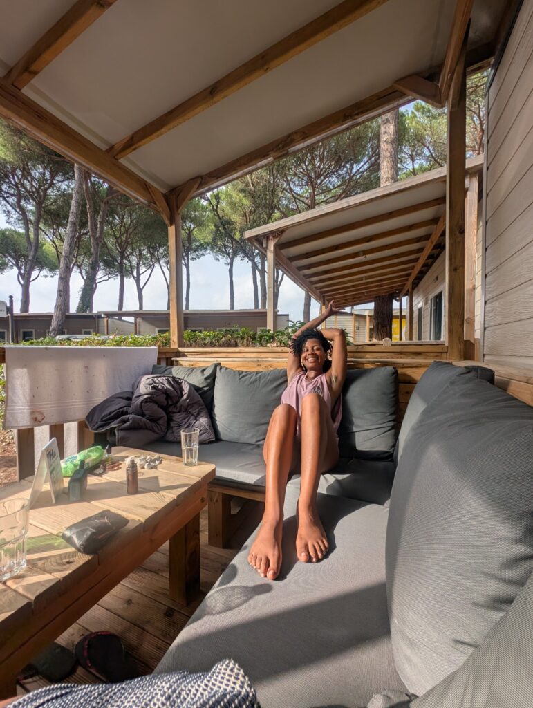 Relaxing on an outdoor sofa at a caravan holiday park in Tuscany, Italy.